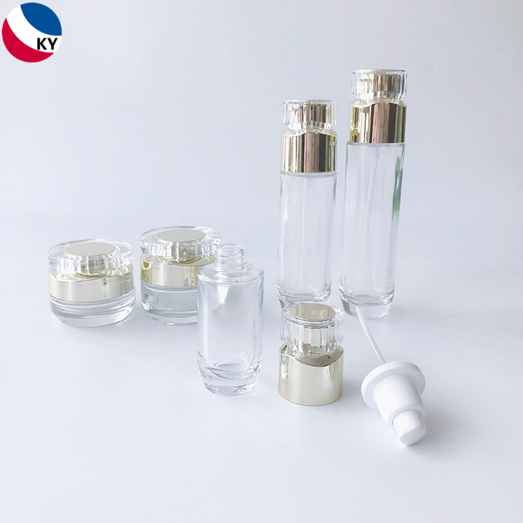 Luxury Cosmetic Packaging Sets Round Thick Bottom 30g 50g 30ml 50ml 100ml Cream Jar Clear Glass Pump Bottle with Gold Pump