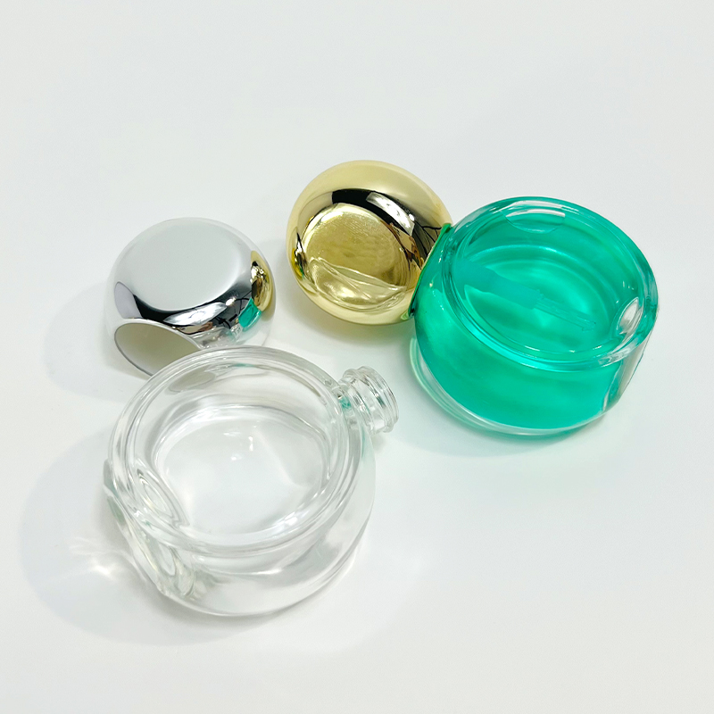 High Quality Cosmetic Packaging Oblate Round Clear Thick Bottom 40ml Lotion Concealer Glass Pump Bottle with Sphere Pump Cap