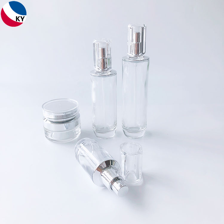 Luxury Round Bottom 30g 50g 30ml 50ml 100ml Cream Jar Clear Glass Pump Bottle with Silver Pump Acrylic Cap