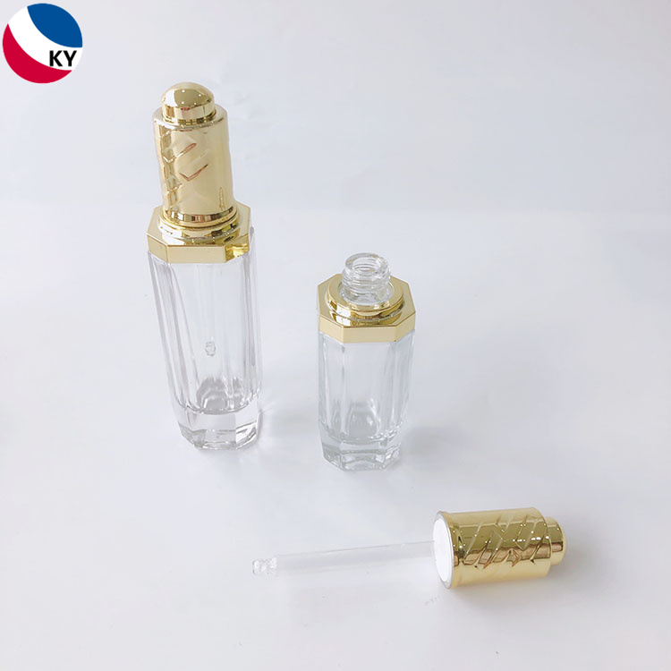 30ml 50ml Push Button Pump Transparent Thick Unique Glass Cosmetic Dropper Packaging Bottle with Gold Press Dropper