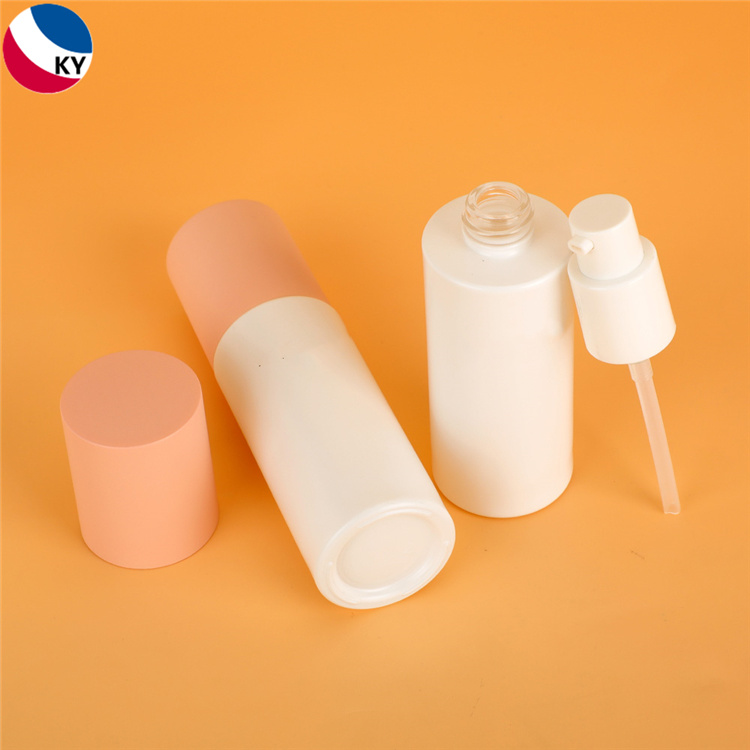 Luxury Cosmetic Cylinder foundation matte white frosted color 40ml glass Pump Bottle with colorful Pump Cap