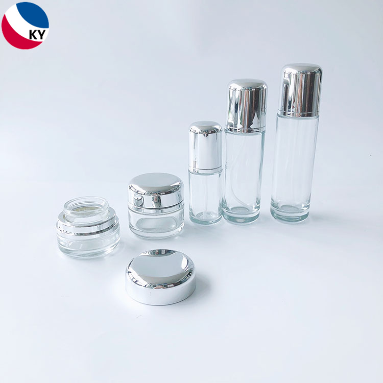 Luxury Round Bottom 30g 50g 30ml 50ml 100ml Cream Jar Round Cap Clear Glass Pump Bottle with Silver Pump packaging