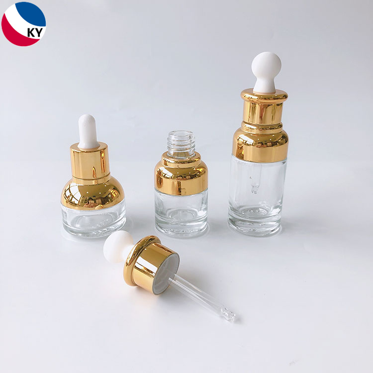 Luxury 15ml 30ml 50ml Round Gold Shoulder High Quality Clear Glass Bottle Dropper Clear Glass Bottles Rubber Oblate Dropper